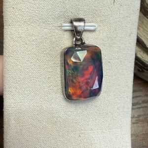 Man made aurora opal